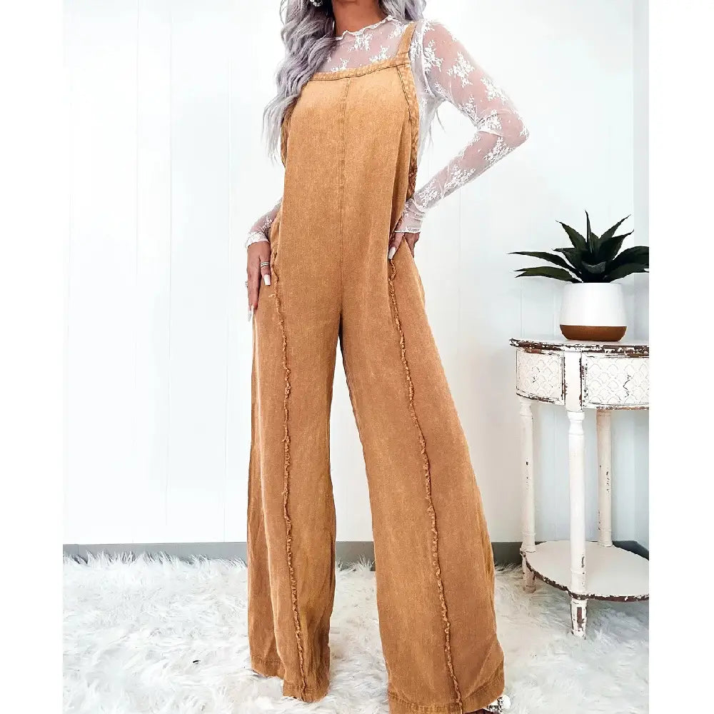 women wide leg denim jumpsuit featuring tan corduroy overalls with frayed side seams and a lace-trimmed neckline in a vintage long style