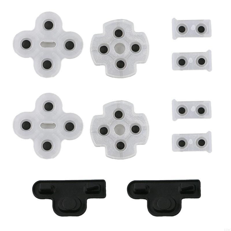 Leitfähige Gummieinlagen aus weißem Kunststoff für den Richtungs-Pad des PlayStation-3-Controllers mit schwarzen Tastenmitten und passenden schwarzen Befestigungsklammern.
