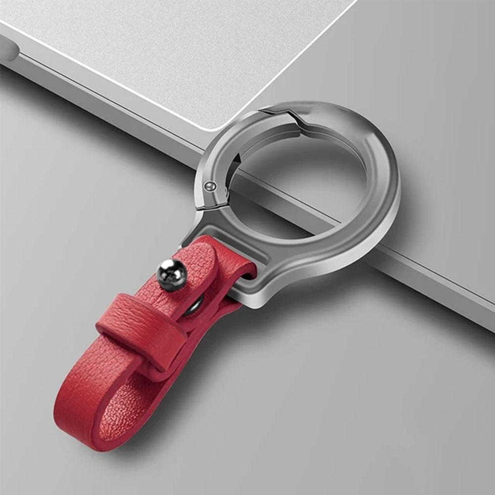 Red leather strap with a durable silver metal ring and clasp designed as a leather car keychain and key ring holder for attaching to laptops or bags.