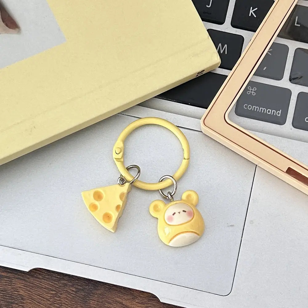 Yellow keychain featuring a cheese slice and bear charm pendant from the Cheese Mouse cartoon keychain kawaii bag charm collection.