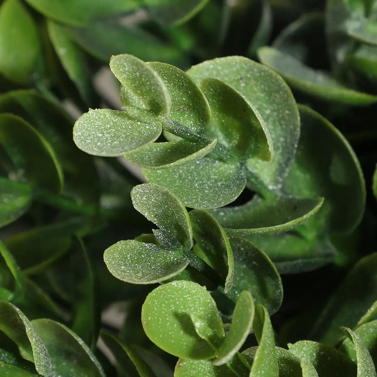 artificial plants small potted eucalyptus 17cm with artificial green foliage featuring glossy curled leaves and a subtle glittery texture