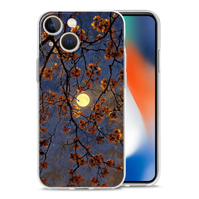 Transparent iPhone case with orange blossoms and branches design on the back against a dark blue night sky with a full moon, named artistic night sky transparent iPhone case.