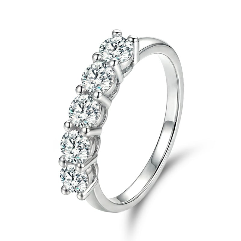 A sterling silver zircon ring for women featuring a sleek silver band with five round sparkling diamonds set in a classic prong design.