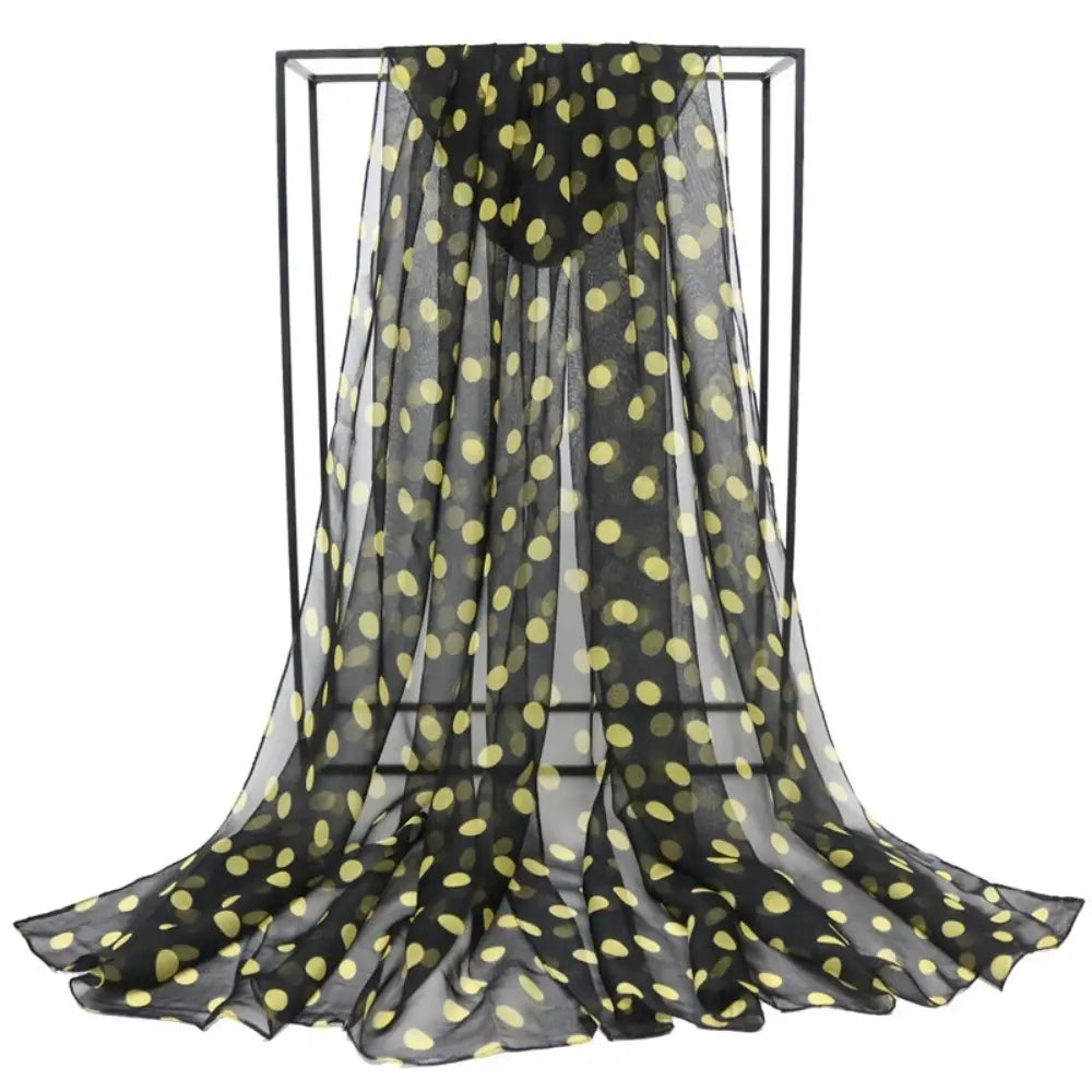 black sheer silk head wrap scarf with vibrant yellow polka dots designed as a polka dot silk head wrap scarf