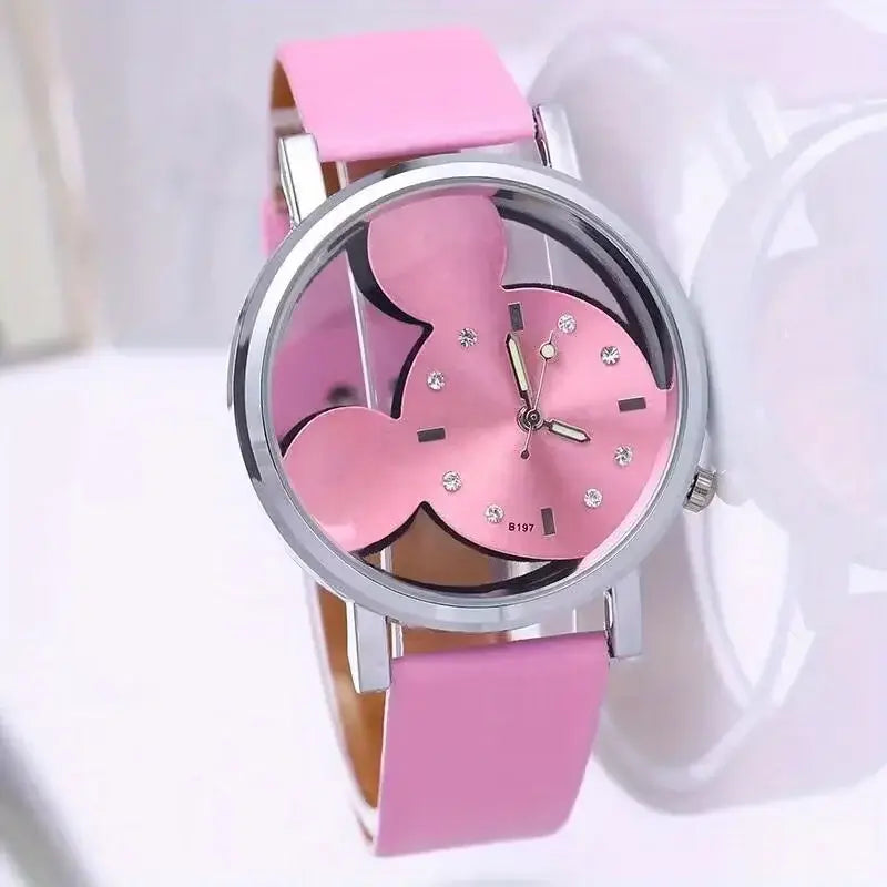 mickey mouse leather kids quartz watch with a pink leather strap silver-toned case and a pink face featuring a minnie mouse silhouette adorned with small rhinestones