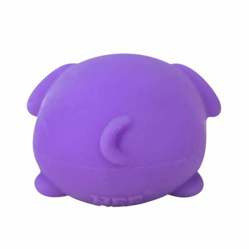 purple silicone pug-shaped stress ball with rounded ears and small tail shown from the front as a sensory fidget toy