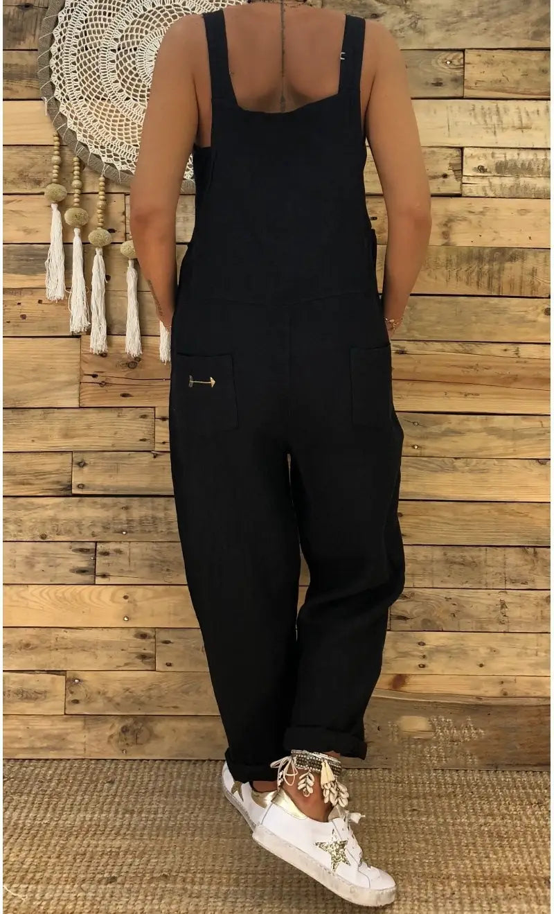 Schwarzer Baumwoll-Latzhosen-Overall mit eckigem Ausschnitt und Seitentaschen, entworfen als lockere Jeans-Sommerlatzhosen für Damen.