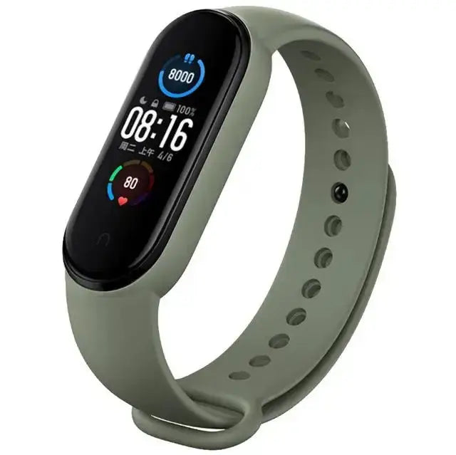 olive green xiaomi mi band wristband silicone bracelet with a black rectangular screen displaying time steps and heart rate as a silicone bracelet wrist for fitness tracking.