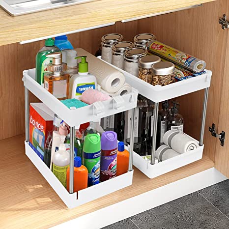 Organisateur d’évier coulissant à deux niveaux de couleur blanche, avec panneaux latéraux transparents et cadre métallique, conçu comme rangement de placard pour une utilisation en cuisine et en salle de bain