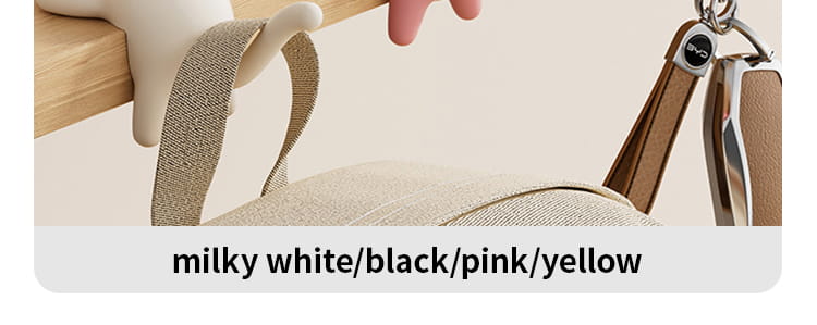 milky white cat desk hook silicone organizer with black pink and yellow accents featuring a textured fabric strap and metallic hardware
