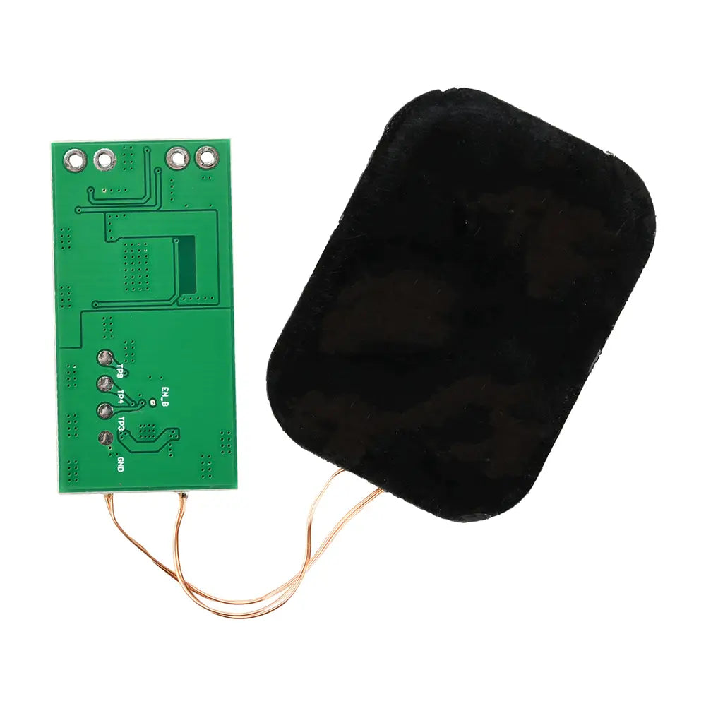 green circuit board with copper wires and black padded pad showing the back side of a 5w wireless charging receiver module for 3.7v battery
