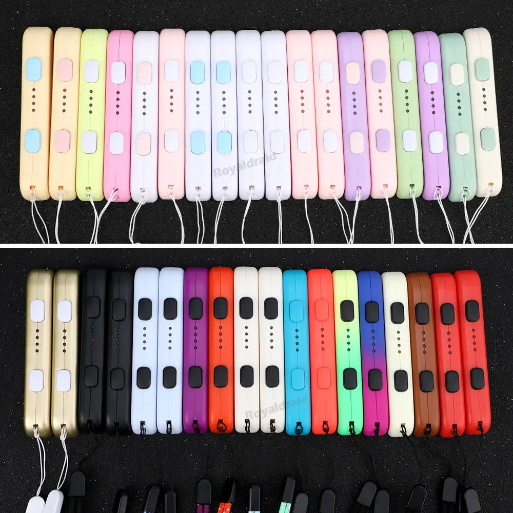Colección de cargadores portátiles delgados de colores con carcasa de plástico de tacto suave y cuerdas para la mano con correa para la muñeca a juego para reemplazo de Joy-Con de Switch