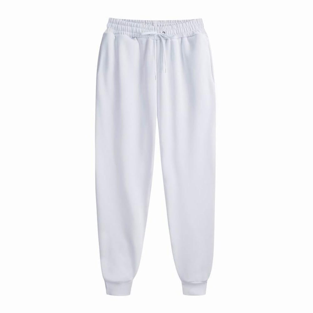 Survêtements jogger en molleton en coton blanc pour homme, avec taille élastique munie d’un cordon, coupe décontractée et poignets fuselés, idéals pour des entraînements décontractés.