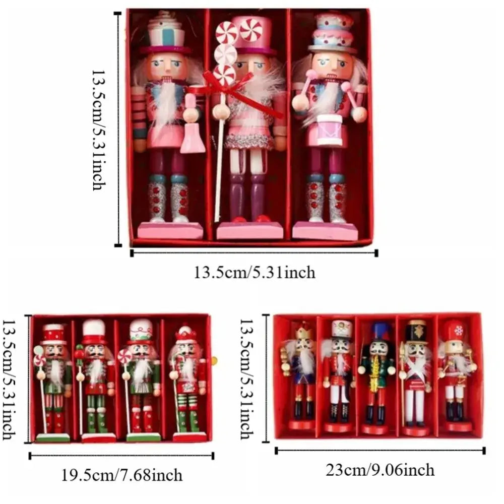 Set of three pink and purple wooden nutcracker figurines in a red box for christmas tree decoration gift