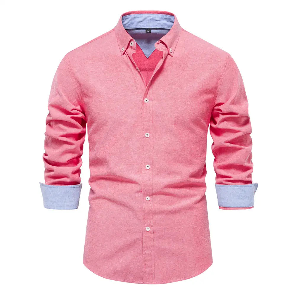 A pink textured cotton dress shirt with light blue contrast collar and cuffs long sleeve suitable for fashion social shirts.