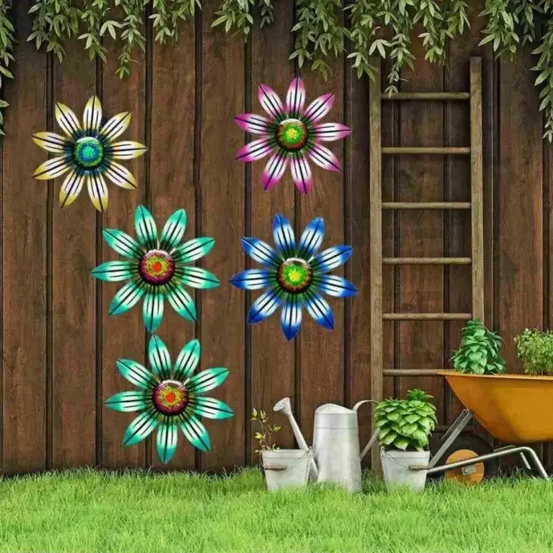 Vibrant metal sunflower wall art sculpture featuring colorful layered petals and glossy centers crafted from metal for decorative use.