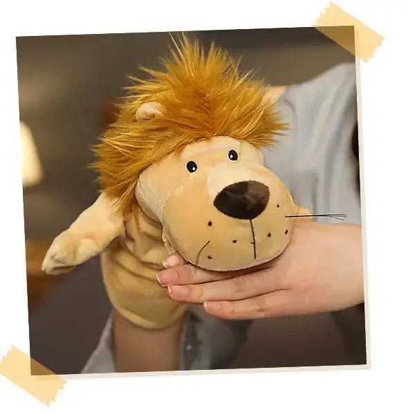 A plush lion hand finger puppet with a golden mane, tan body, and black nose designed as an educational baby toy in the lion elephant bunny collection.