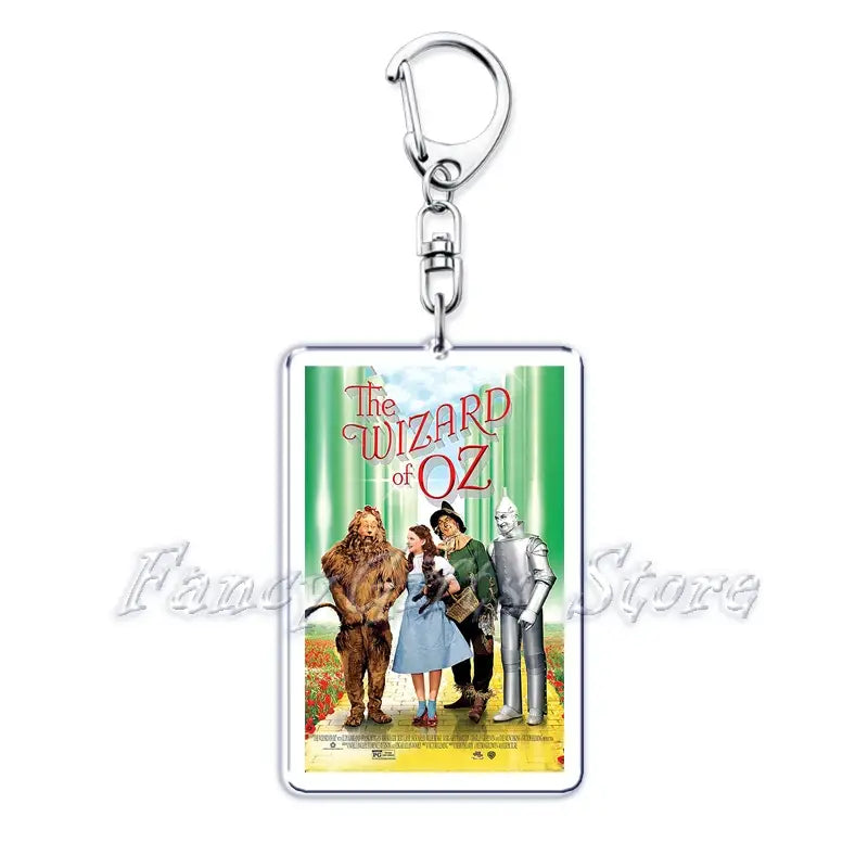 Silver rectangular acrylic keychain featuring a printed image of the movie poster for the Wizard of Oz with its iconic characters in the movie poster acrylic keychain set.