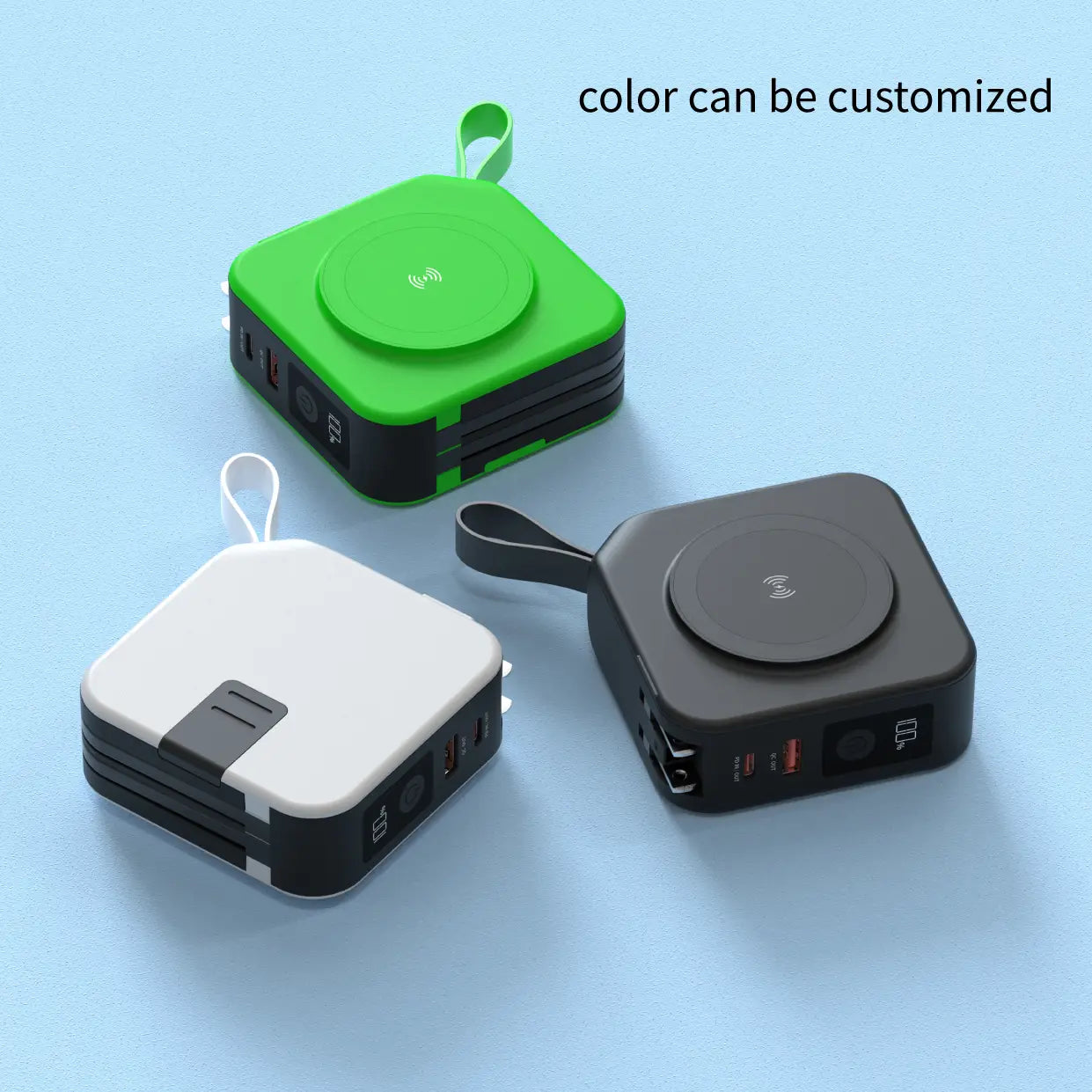 compact square-shaped magnetic wireless power banks in green white and black with integrated wireless charging pads carrying loops and 15w max output for portable device charging