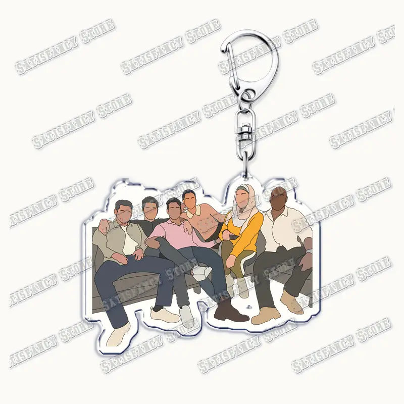 Clear acrylic keychain featuring a colorful illustration of six characters from the show the bear sitting together on a couch, ideal as a firefighter gift from the 9-1-1 TV show collection.