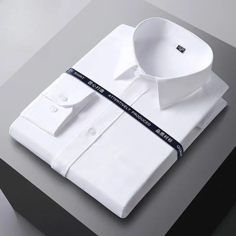 A crisp white men long sleeve dress shirt with a classic collar buttoned cuffs anti wrinkle fabric neatly folded and wrapped with a black ribbon for formal office wear.