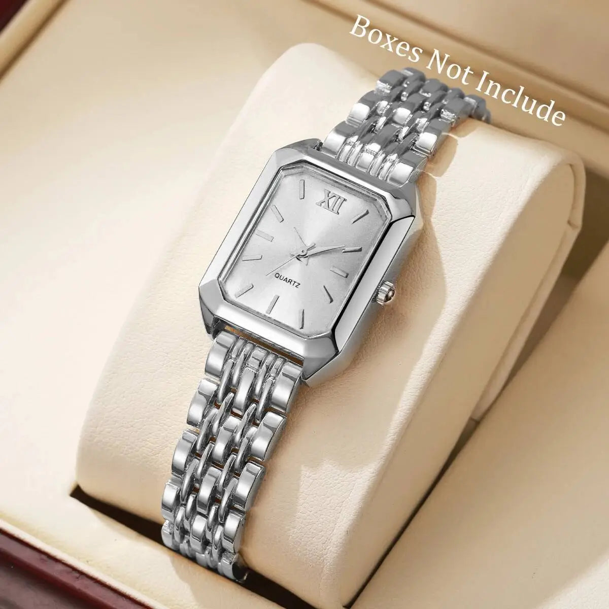 Silver rectangular quartz watch with a sleek metallic bracelet and roman numeral hour markers designed as a women gold rectangle quartz watch with a mesh strap.