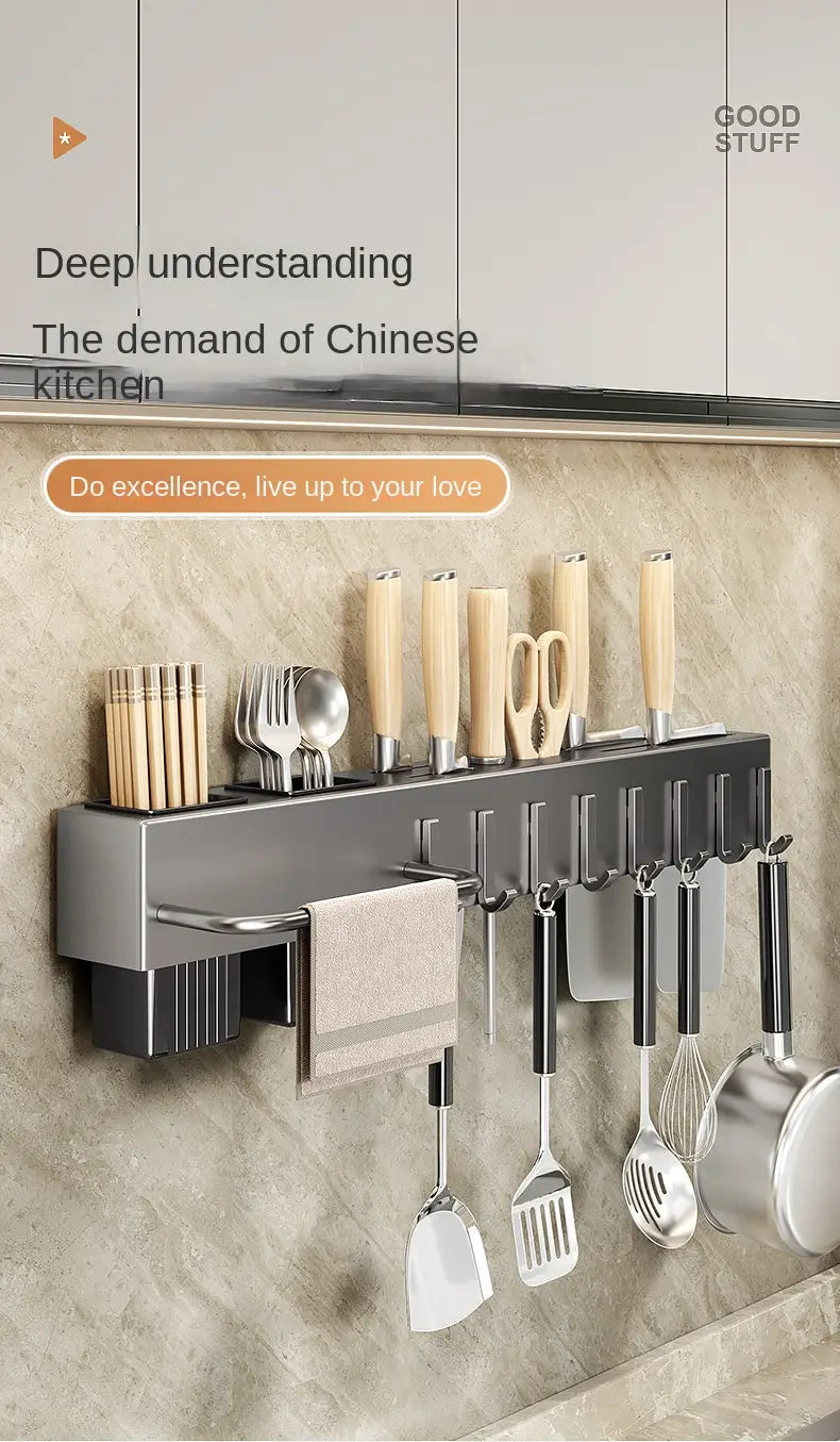 Silver metallic wall mounted kitchen utensil holder and knife rack featuring wooden-handled cutlery and hanging cooking tools for organized storage.