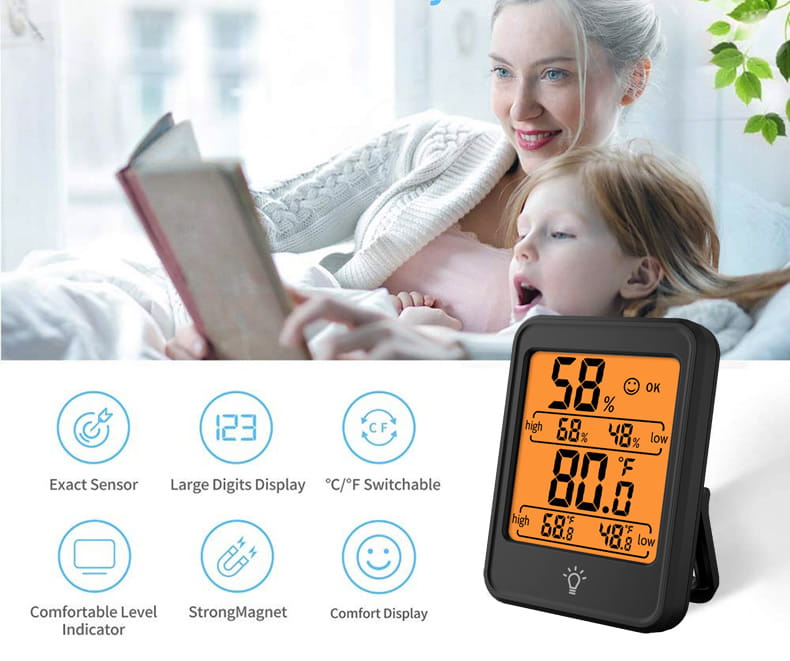 Medidor digital interior de temperatura y humedad con soporte, que presenta un termómetro y un higrómetro digitales negros con retroiluminación naranja que muestran lecturas de temperatura y humedad.