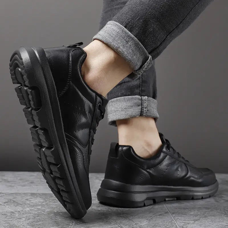 men black leather chunky sole sneakers featuring a chunky rubber sole and laces