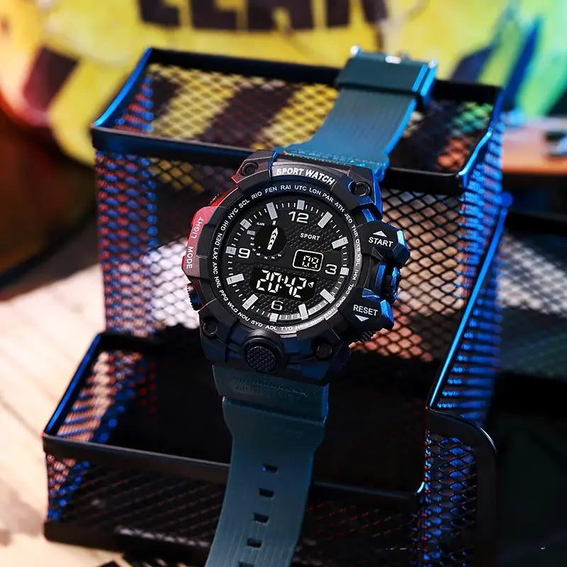 Men’s waterproof digital sports watch with a black and red display and a blue silicone strap designed for athletic use.