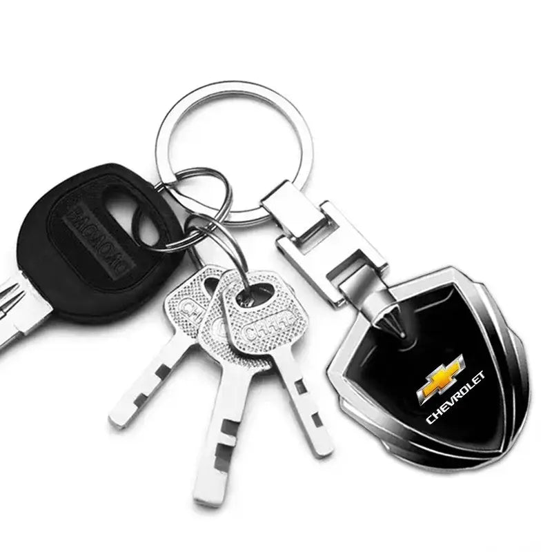 Chevrolet metal shield car keychain in black and silver featuring a shield-shaped design and made of metal for holding keys.
