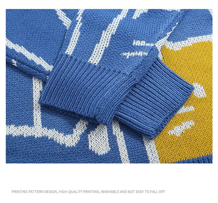 Pull ample en maille bleue à motif de chat de dessin animé Harajuku, avec des motifs géométriques blancs et jaunes sur les manches