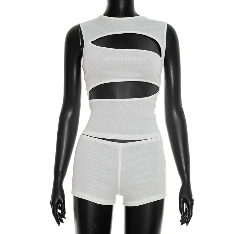 white ribbed knit two-piece set featuring horizontal cutout details with a tank top and shorts design