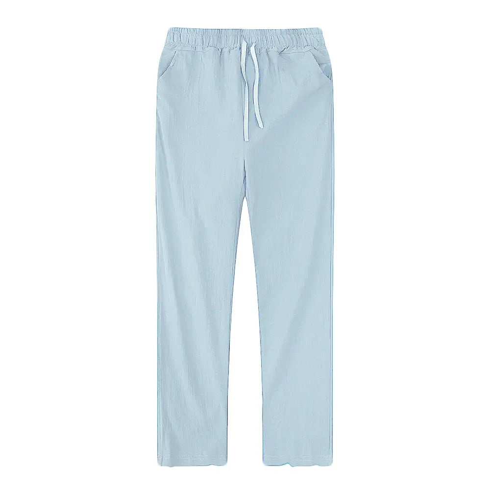 light blue men cotton linen trousers with a breathable fabric, loose fit, elastic waistband, and matching drawstring for casual wear.