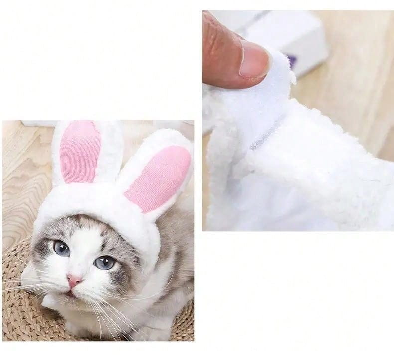 Gorro blanco con orejas de conejo y forro interno rosa, elaborado con material de peluche, diseñado como vestimenta para mascota ajustable tipo tocado.