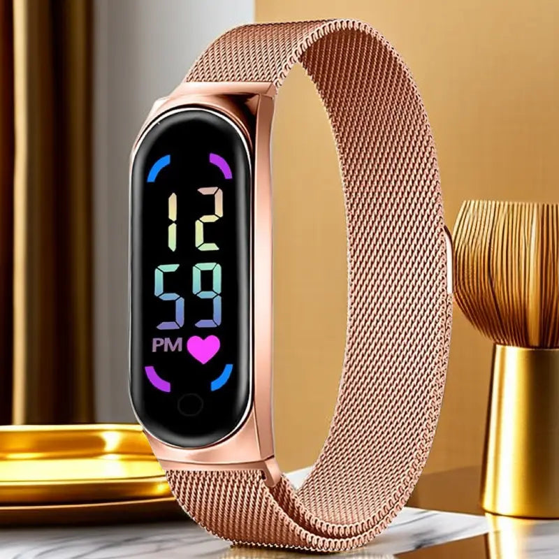 Rose gold digital watch led touch waterproof with a mesh band and a sleek rectangular screen displaying colorful time and heart rate indicators.