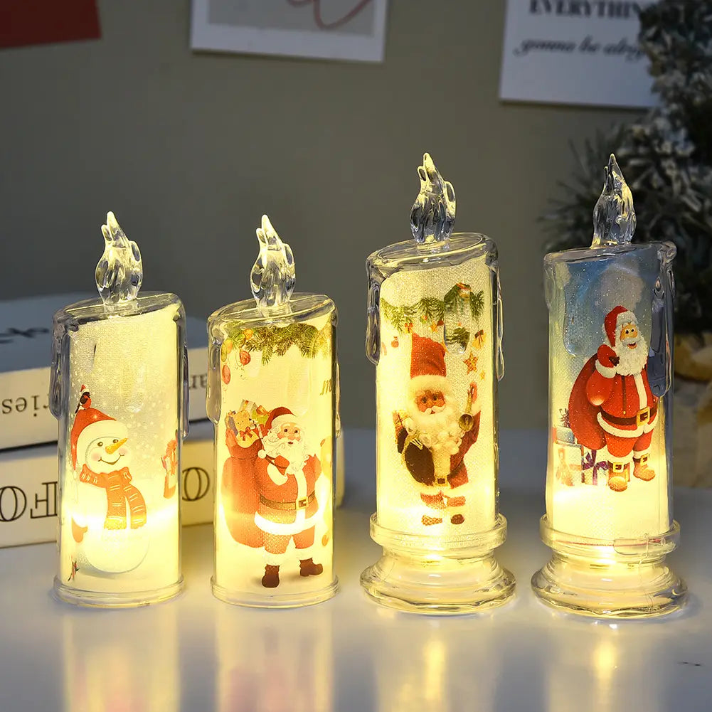 vier beleuchtete Glas-LED-Weihnachtskerzen-Dekorationen mit eingebauten, bedruckten LEDs und niedlichen Weihnachtsillustrationen von Santa Claus und Schneemann mit klaren Kristall-Flammenaufsätzen