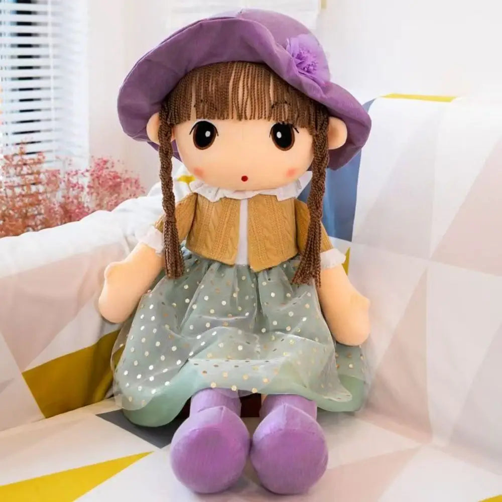 A plush doll 45cm stuffed animal toy with brown braided hair, wearing a purple flower-adorned hat, a tan knitted cardigan, and a light green polka-dotted skirt.