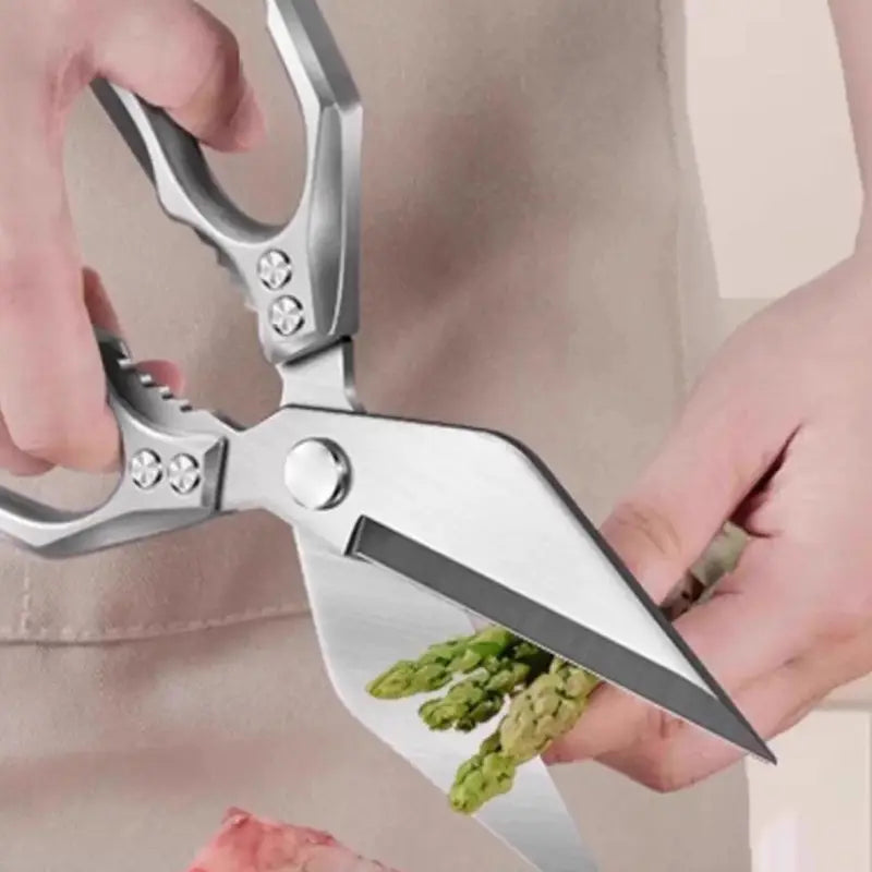Edelstahl-Multifunktionsküchenscheren mit scharfer, spitzer Klinge und ergonomisch strukturierten Griffen in Silberfarbe.