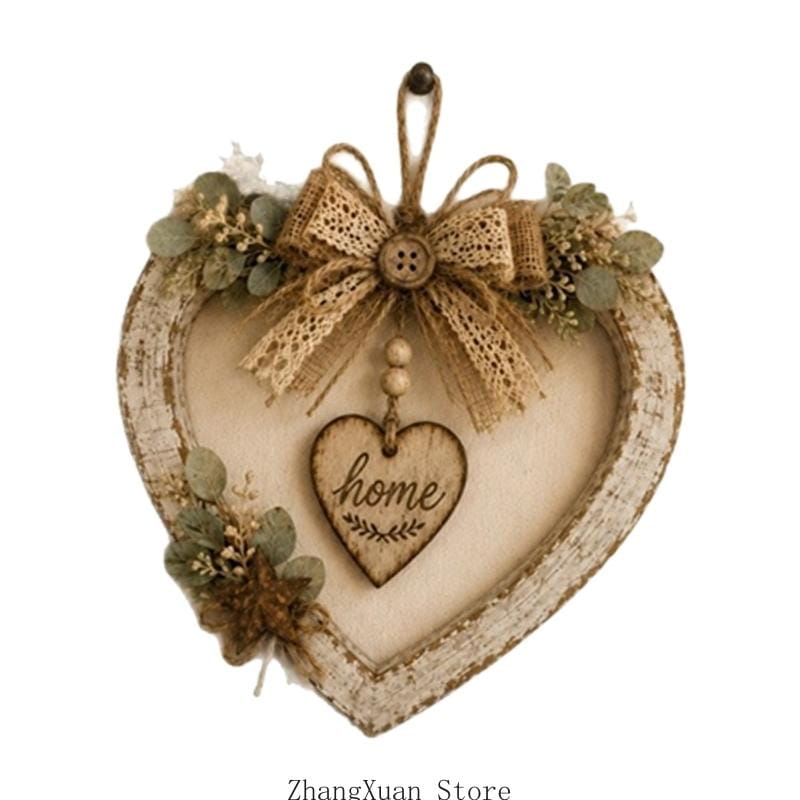 Plaque murale rustique en forme de cœur à DEL en bois, finition blanche vieillie, décorée de verdure séchée et d’un nœud en toile de jute avec un centre à bouton pour la décoration intérieure.