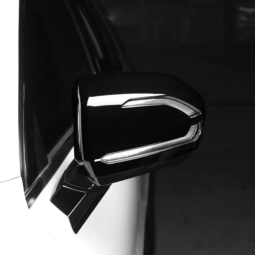 Black glossy Hyundai Palisade led mirror cover 2020-2025 with sleek angular design and integrated led light strip.