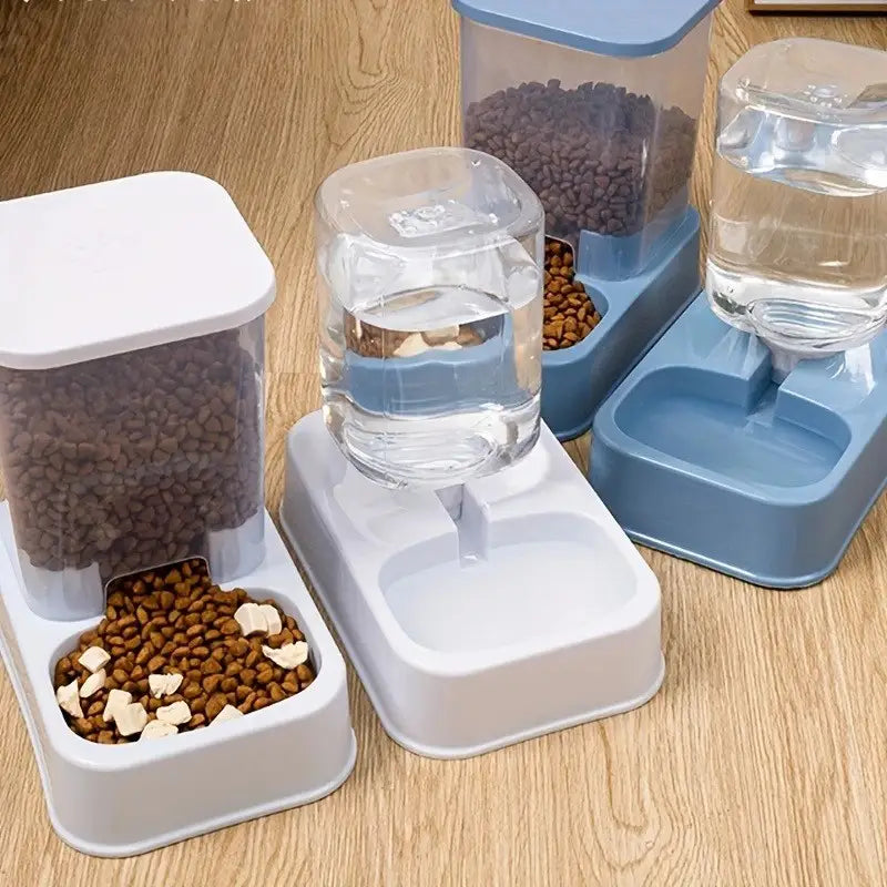 white plastic automatic pet feeder with a clear container filled with dry kibble and a separate black plastic water bowl dispenser for pets