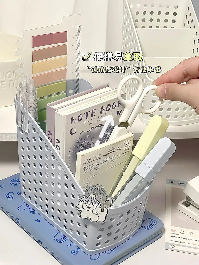 White perforated plastic desktop stationery organizer with a cute cartoon dog charm for makeup and pen storage.