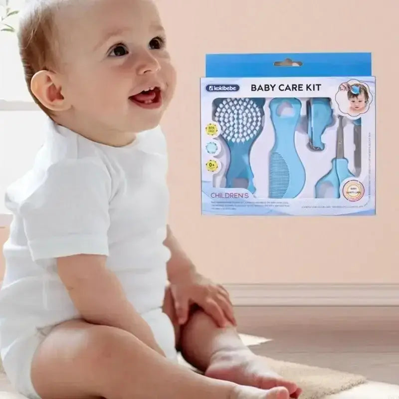Hellblaues Kunststoff-Baby-Pflegeset für das Grooming mit weichen Borsten, Bürste, Kamm und Schere in einem verpackten Pflegeset für Säuglinge.