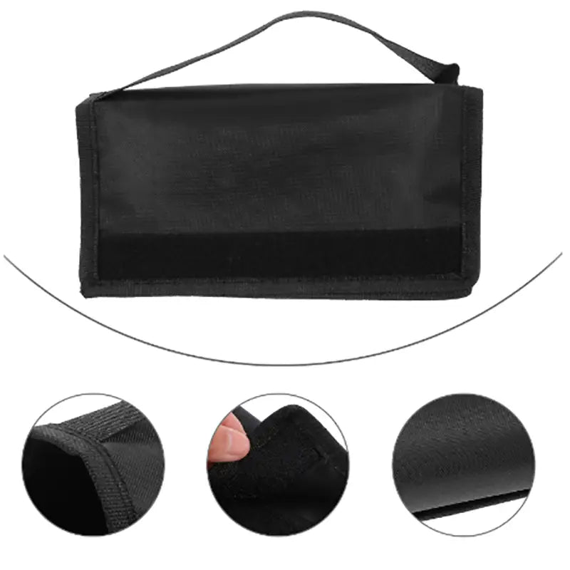 Black fabric soccer agility hurdle carrying strap and storage bag with a top handle and reinforced stitching.