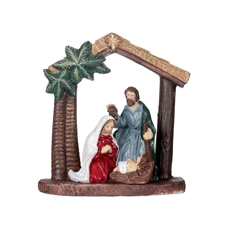 クリスマステーブルの装飾用として、赤いドレスと白いベールのマリア、青い衣のヨセフ、緑のヤシの葉で飾られた素朴な木製の厩（うまや）アーチの下にある飼い葉おけの幼子イエスを描いた、詳細な樹脂製降誕飾りセット。