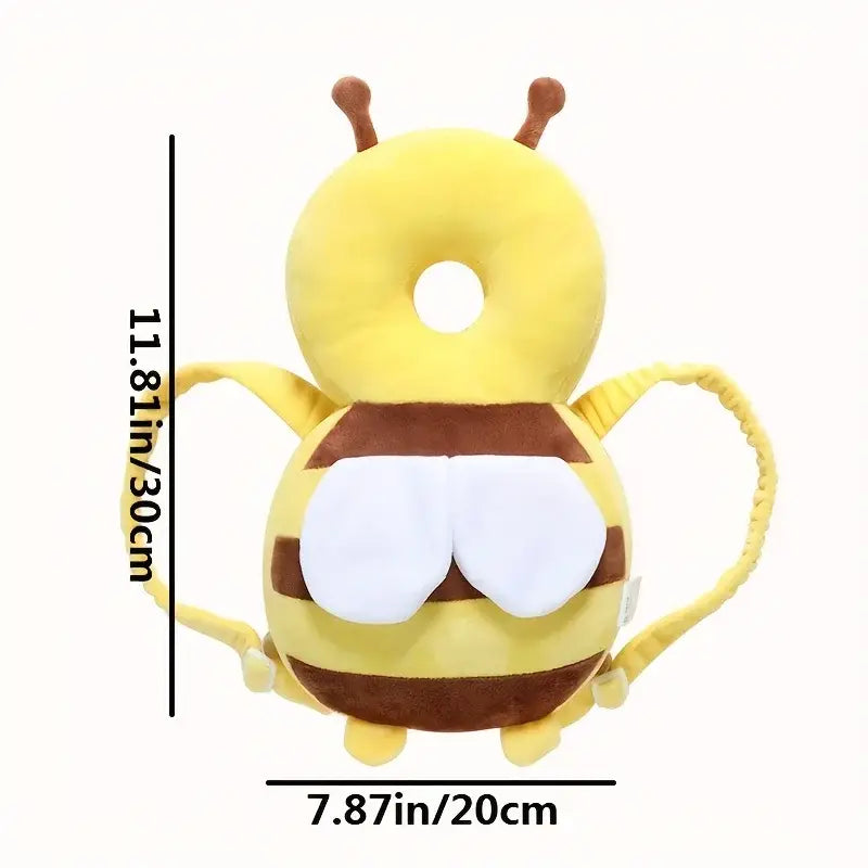 mochila protectora para bebé con forma de cabeza, de peluche con aspecto de abeja, color amarillo y marrón, con detalles de alas blancas, diseñada como almohada de seguridad antivuelco