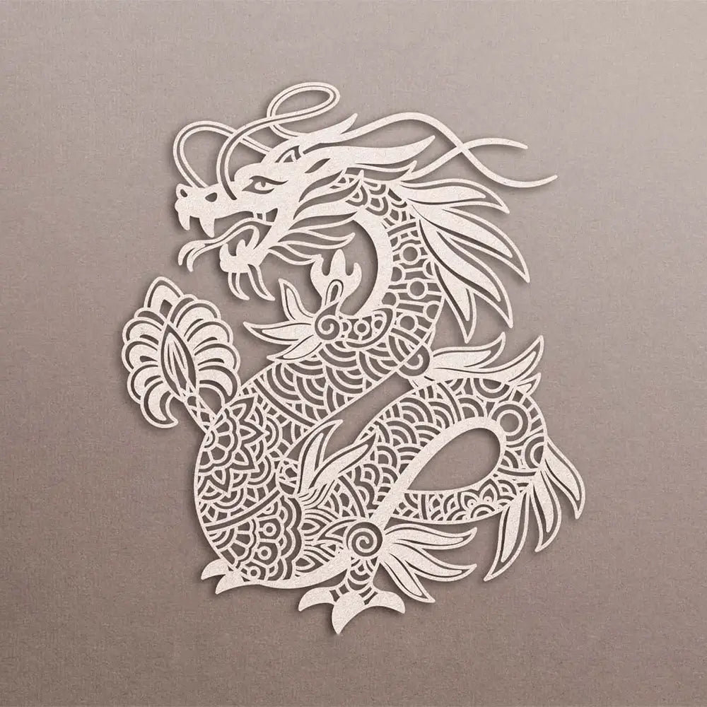 A delicate white paper-cut dragon metal cutting die with intricate lace-like patterns and ornate flowing details for Chinese New Year crafts.