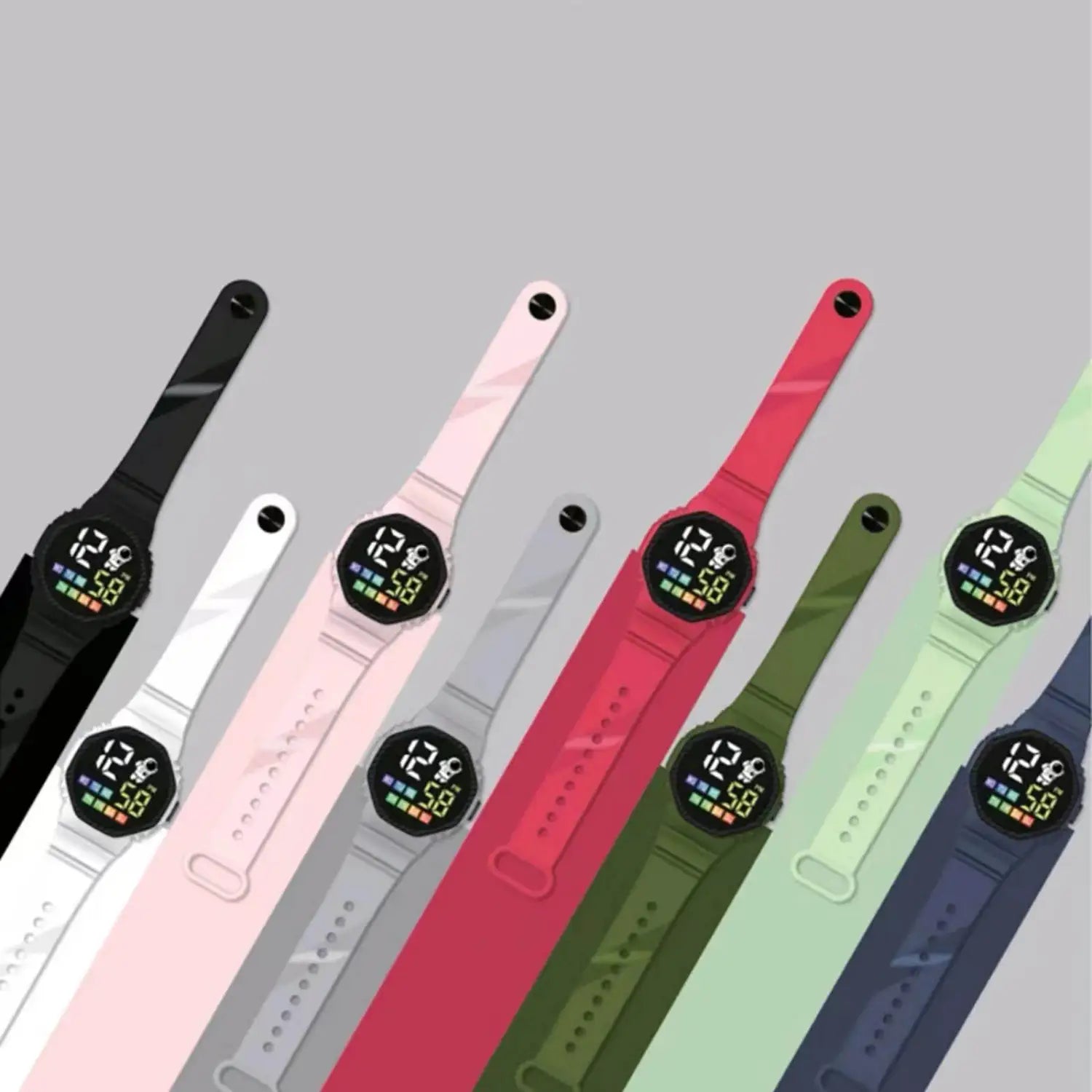 A collection of colorful kids waterproof led digital astronaut watches with silicone straps and black circular faces displaying time.