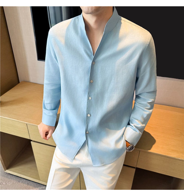 Men’s linen long-sleeved mandarin collar shirt in light blue with subtle gradient fade to white at the bottom.